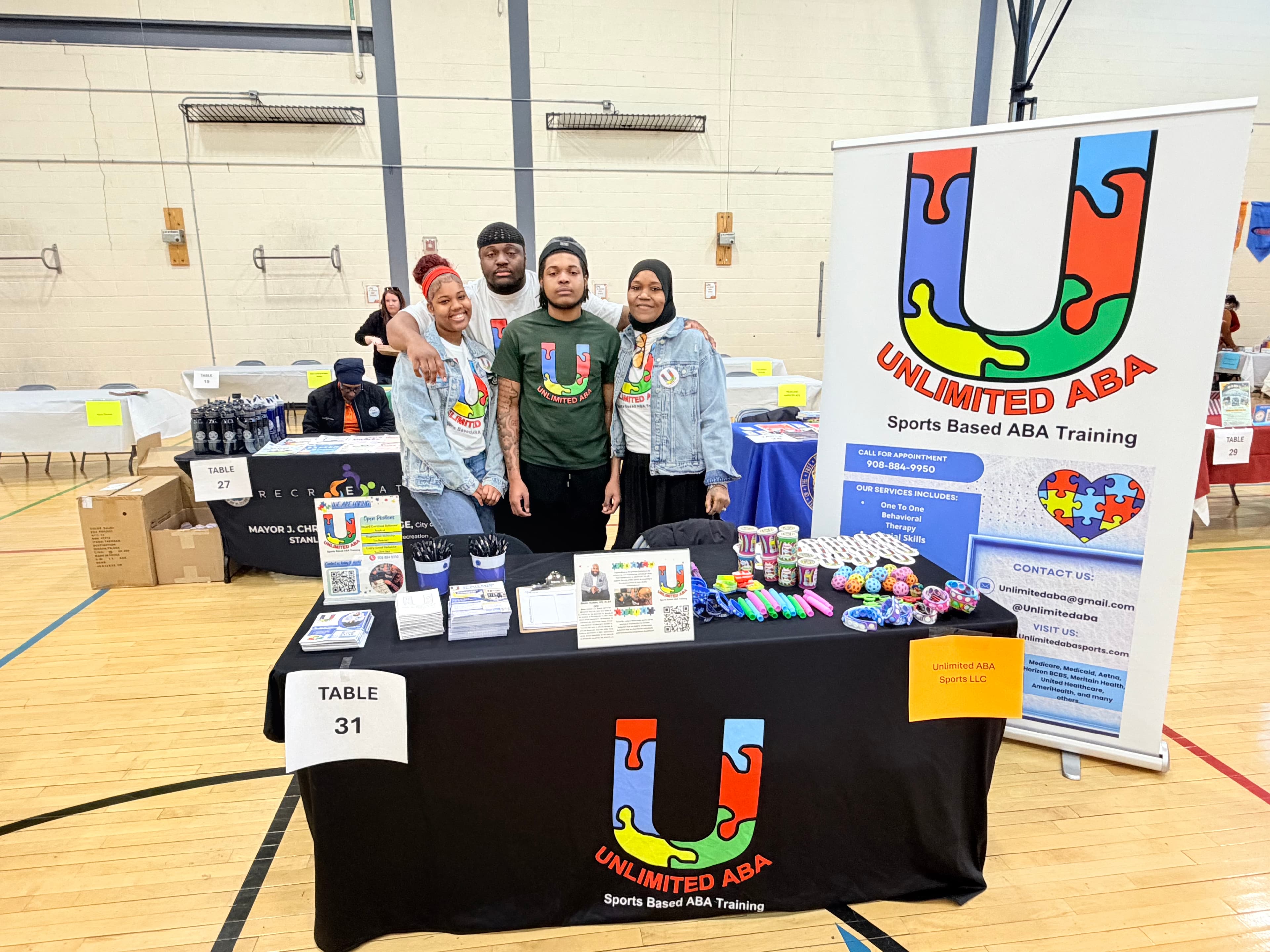 Basim Hudeen engaging with families at an Unlimited ABA Sports community event